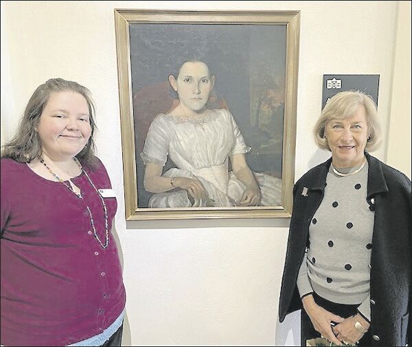 Rebecca Guest and Betsy White with Chastain's portrait
